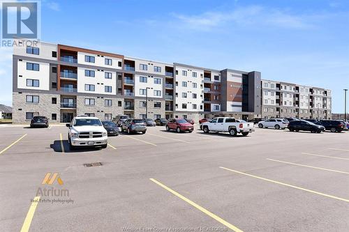 2550 Sandwich West Parkway Unit# 216, Lasalle, ON - Outdoor With Balcony With Facade