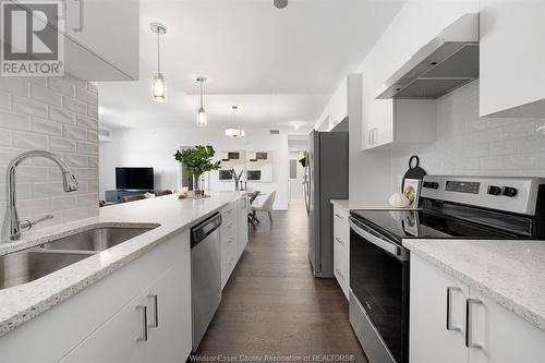 2550 Sandwich West Parkway Unit# 216, Lasalle, ON - Indoor Photo Showing Kitchen With Stainless Steel Kitchen With Double Sink With Upgraded Kitchen