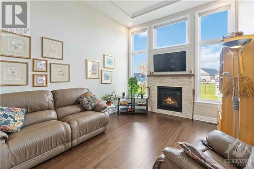 2660 Chamberland North Street, Rockland, ON - Indoor Photo Showing Living Room With Fireplace