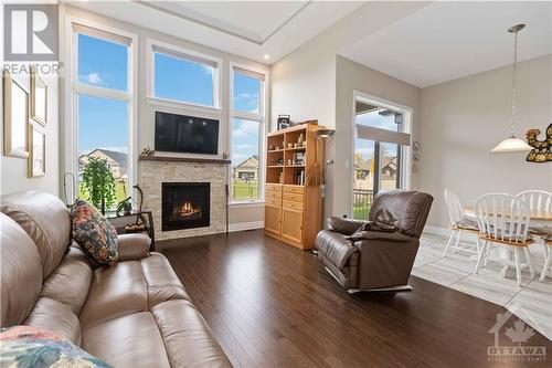 2660 Chamberland North Street, Rockland, ON - Indoor Photo Showing Living Room With Fireplace