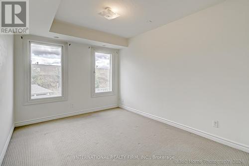 Th9 - 145 Long Branch Avenue, Toronto, ON - Indoor Photo Showing Other Room