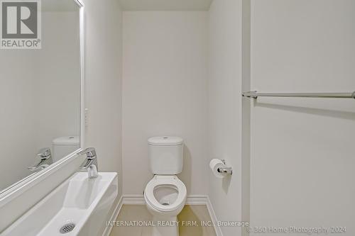 Th9 - 145 Long Branch Avenue, Toronto, ON - Indoor Photo Showing Bathroom