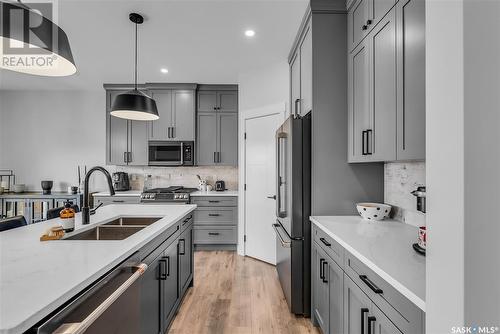 370 Chelsom Manor, Saskatoon, SK - Indoor Photo Showing Kitchen With Double Sink