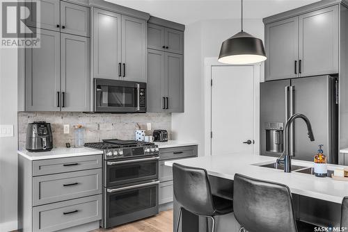 370 Chelsom Manor, Saskatoon, SK - Indoor Photo Showing Kitchen With Double Sink With Upgraded Kitchen