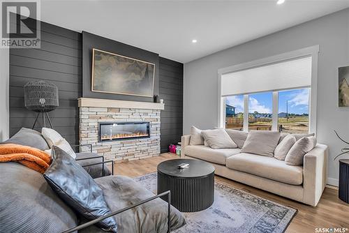 370 Chelsom Manor, Saskatoon, SK - Indoor Photo Showing Living Room With Fireplace