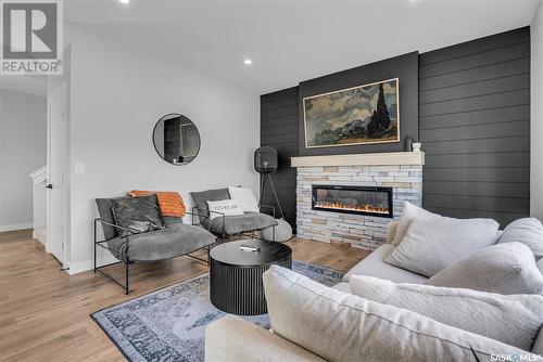 370 Chelsom Manor, Saskatoon, SK - Indoor Photo Showing Living Room With Fireplace