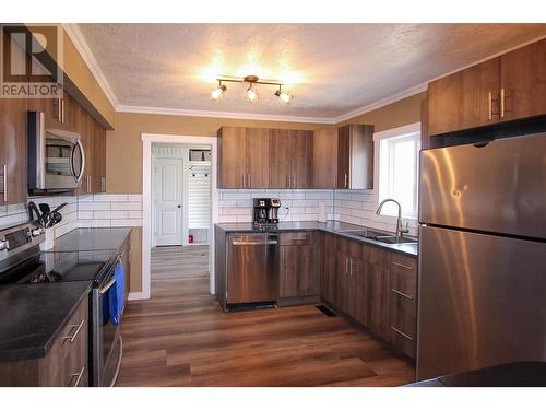 1608 95 Avenue, Dawson Creek, BC - Indoor Photo Showing Kitchen With Stainless Steel Kitchen With Double Sink