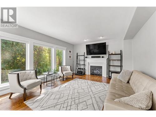 5327 Hedeman Court, Kelowna, BC - Indoor Photo Showing Living Room With Fireplace