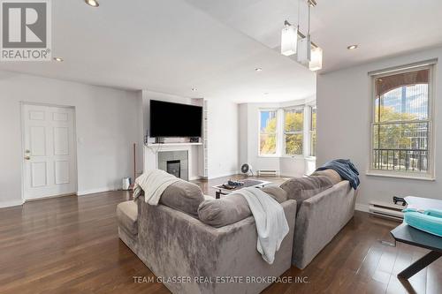 303 - 440 Wellington Street, London, ON - Indoor Photo Showing Living Room With Fireplace