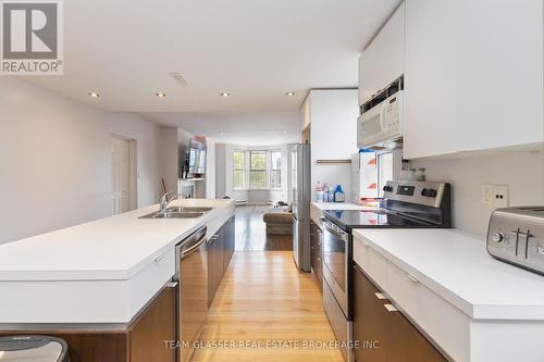 303 - 440 Wellington Street, London, ON - Indoor Photo Showing Kitchen With Double Sink