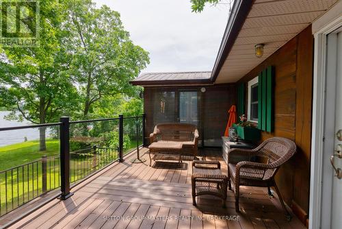 409 Red Cedar Point Road, Stone Mills, ON - Outdoor With Deck Patio Veranda With Exterior