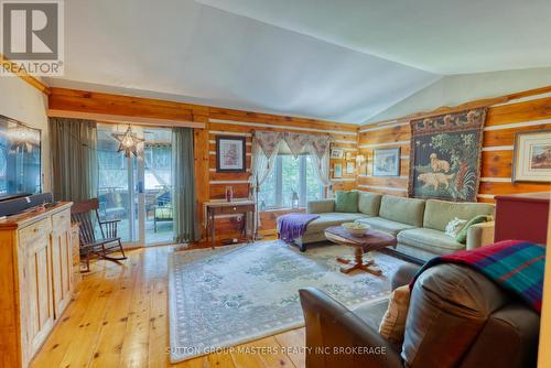 409 Red Cedar Point Road, Stone Mills, ON - Indoor Photo Showing Living Room