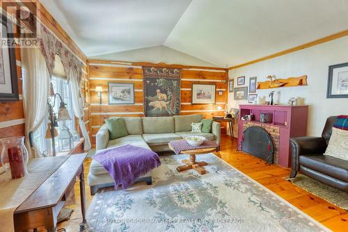 409 Red Cedar Point Road, Stone Mills, ON - Indoor Photo Showing Living Room