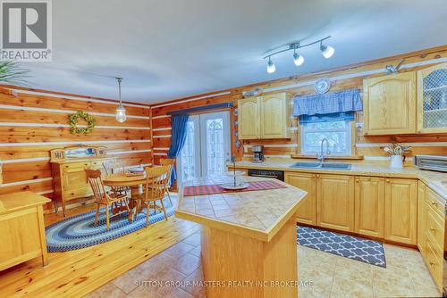 409 Red Cedar Point Road, Stone Mills, ON - Indoor Photo Showing Kitchen With Double Sink