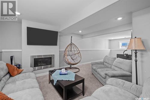 11 Wickens Place, Prince Albert, SK - Indoor Photo Showing Living Room With Fireplace