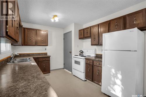 27 Galbraith Crescent, Saskatoon, SK - Indoor Photo Showing Kitchen With Double Sink