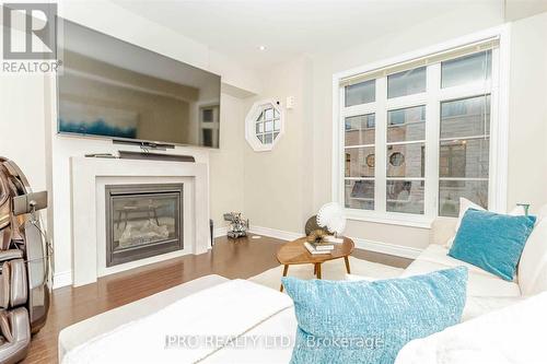 74 - 250 Royalton Common, Oakville, ON - Indoor Photo Showing Living Room With Fireplace