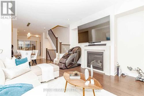 74 - 250 Royalton Common, Oakville, ON - Indoor Photo Showing Living Room With Fireplace