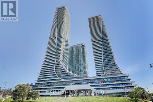 602 - 20 Shore Breeze Drive, Toronto, ON - Outdoor With Balcony With Facade