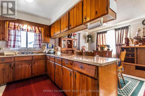 1295 Cannon Street E, Hamilton, ON - Indoor Photo Showing Kitchen With Double Sink