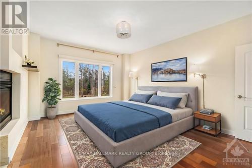 4785 Whispering Willow Drive, Ottawa, ON - Indoor Photo Showing Bedroom With Fireplace