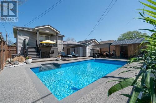 707 Charles Street, Point Edward, ON - Outdoor With In Ground Pool