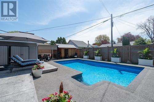 707 Charles Street, Point Edward, ON - Outdoor With In Ground Pool With Deck Patio Veranda With Backyard