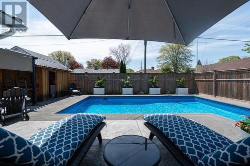 707 Charles Street, Point Edward, ON - Outdoor With In Ground Pool With Deck Patio Veranda With Exterior