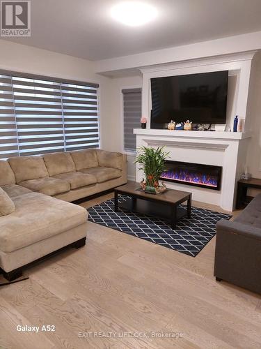 539 Clayton Avenue, Peterborough (Northcrest), ON - Indoor Photo Showing Living Room With Fireplace