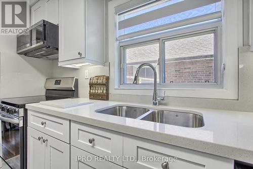 165 Ellesmere Road, Toronto, ON - Indoor Photo Showing Kitchen With Double Sink