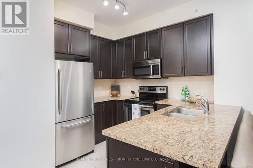 614 - 9255 Jane Street, Vaughan, ON - Indoor Photo Showing Kitchen With Stainless Steel Kitchen With Double Sink With Upgraded Kitchen