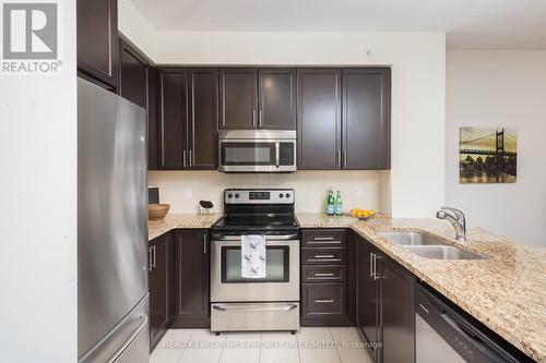 614 - 9255 Jane Street, Vaughan, ON - Indoor Photo Showing Kitchen With Stainless Steel Kitchen With Double Sink