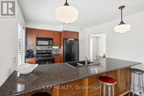 949 Hasselfeldt Heights, Milton, ON - Indoor Photo Showing Kitchen With Double Sink