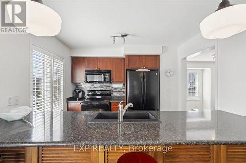 949 Hasselfeldt Heights, Milton, ON - Indoor Photo Showing Kitchen With Double Sink