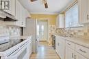 3980 Lennon Court, Windsor, ON  - Indoor Photo Showing Kitchen With Double Sink 