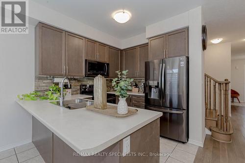 58 Oaktree Drive, Haldimand, ON - Indoor Photo Showing Kitchen With Stainless Steel Kitchen With Double Sink