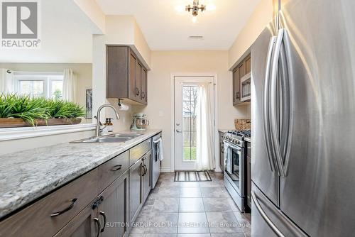 9B - 9 Guthrie Lane, Guelph/Eramosa, ON - Indoor Photo Showing Kitchen With Double Sink