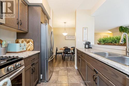 9B - 9 Guthrie Lane, Guelph/Eramosa, ON - Indoor Photo Showing Kitchen With Double Sink