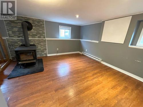 1 Finn Avenue, Grand Falls-Windsor, NL - Indoor Photo Showing Other Room With Fireplace