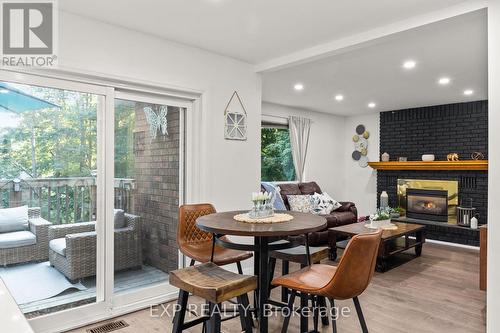 35 Pooles Road, Springwater, ON - Indoor Photo Showing Other Room With Fireplace