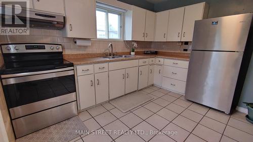 141 Balsam Street N, Timmins, ON - Indoor Photo Showing Kitchen With Double Sink