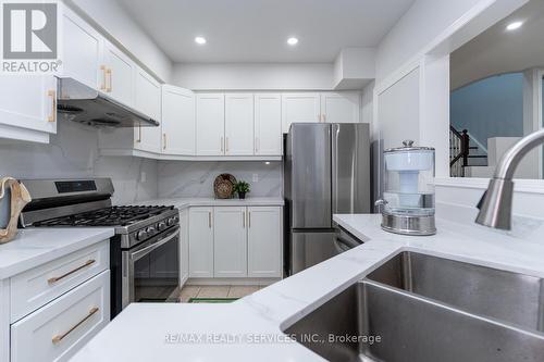 6104 Rowers Crescent, Mississauga, ON - Indoor Photo Showing Kitchen With Double Sink