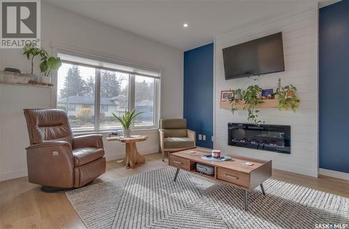 737 1St Street E, Saskatoon, SK - Indoor Photo Showing Living Room With Fireplace