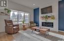 737 1St Street E, Saskatoon, SK  - Indoor Photo Showing Living Room With Fireplace 