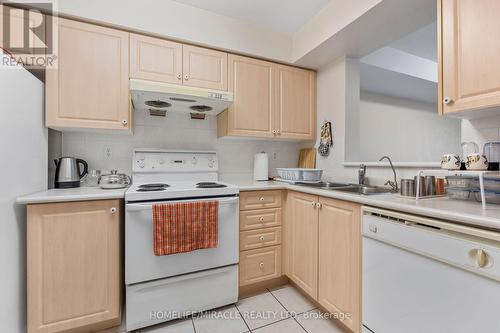 802 - 5039 Finch Avenue E, Toronto, ON - Indoor Photo Showing Kitchen With Double Sink