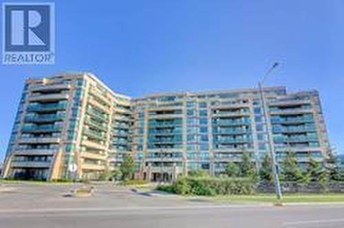 415 - 75 Norman Bethune Avenue, Richmond Hill, ON - Outdoor With Balcony With Facade