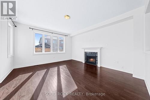 122 Mcdonnell Crescent, Bradford West Gwillimbury, ON - Indoor Photo Showing Living Room With Fireplace