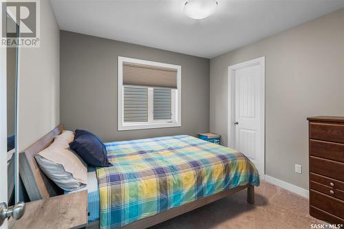 220 Wall Street, Dalmeny, SK - Indoor Photo Showing Bedroom