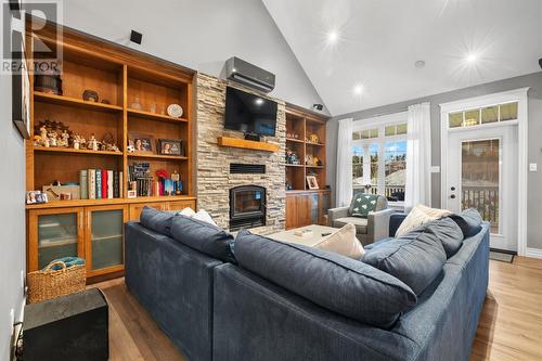 8 Nicholas Place, Paradise, NL - Indoor Photo Showing Other Room With Fireplace