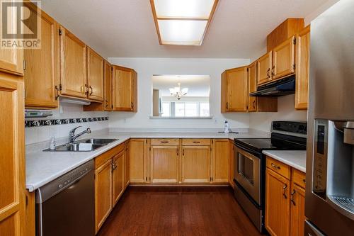 122 801 Preston Road, Prince George, BC - Indoor Photo Showing Kitchen With Double Sink